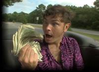 John holds Money